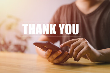 businessman using a smartphone send message thank you, presentation from technology digital....