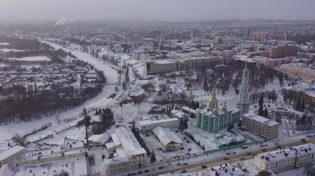 Winter view from a drone of the Spaso-Preobrazhensky Cathedral in the city center and residential areas in Tambov, Russia.