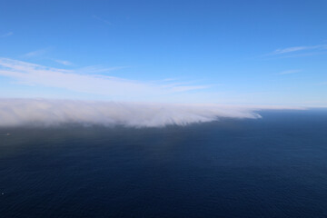 Huge wall of fog coming from the sea towards the North Cape-Nordkapp, Norway     