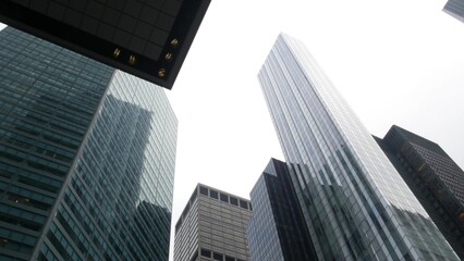 New York City Lower Manhattan, Downtown Financial District or Midtown business architecture, United States. High-rise skyscrapers, office buildings, USA. American urban street, real estate, realty.