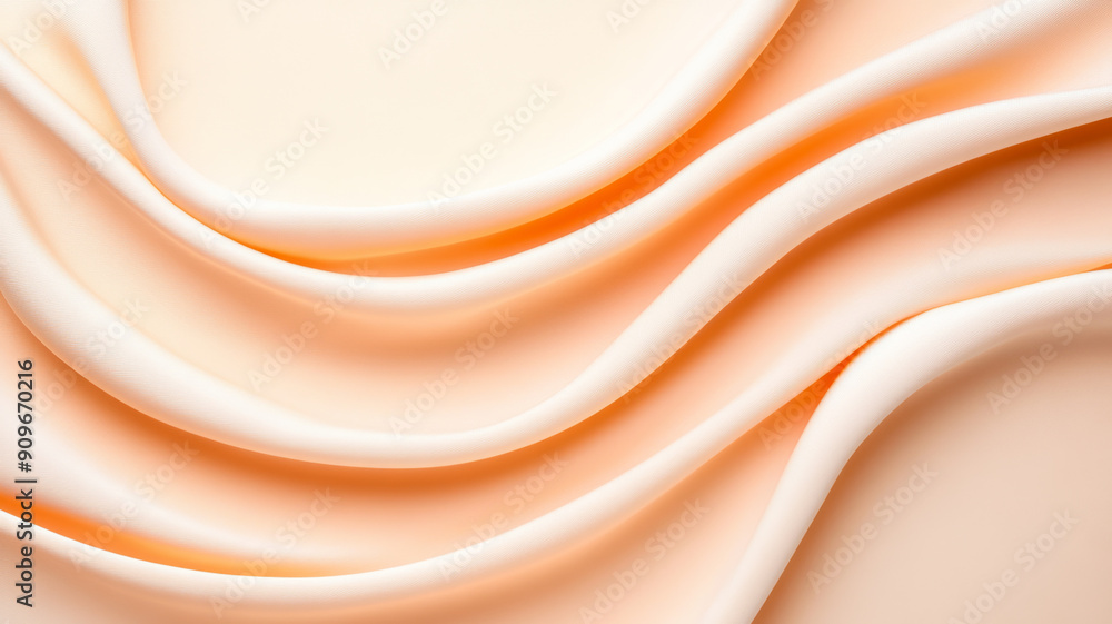 Poster overhead view of a cream background with a smooth, velvety texture in soft peach, highlighted by gen