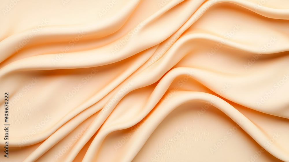 Poster overhead view of a cream background with a smooth, velvety texture in soft peach, highlighted by gen