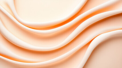 Overhead view of a cream background with a smooth, velvety texture in soft peach, highlighted by gentle swirls 