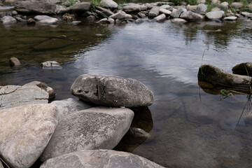 Stone texture, flowing water in the river
