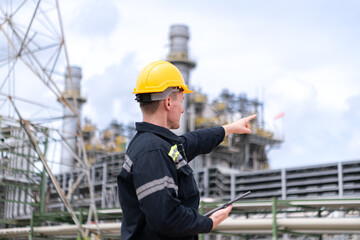 Petroleum engineer is on a mission to inspect oil distillation at a huge oil refinery