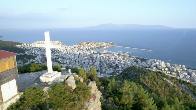 Kavala City Greece, Aerial Dolly Shot, Panoramic view of Town and Cross Monument on Mountain