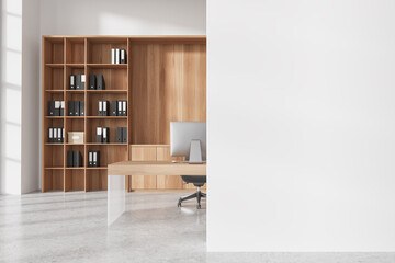 Fototapeta premium Office business interior with work table, pc computer and shelf. Mockup wall