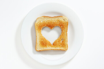 Toasted bread with a heart-shaped cutout