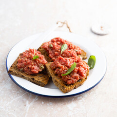 Traditional steak tartare on toast