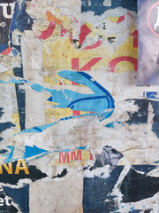 Fototapeta premium Torn and ripped street poster background, abstract and artistic old paper backdrop