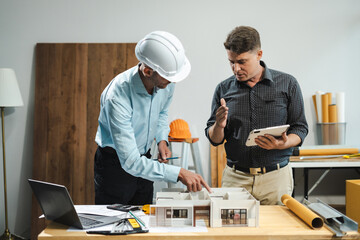 Civil engineer caucasian teams discussing issues at the construction site, industry professional team.