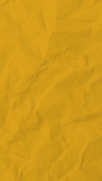 Video effects animation yellow paper background 4k abstract motion surface pattern vertical dark background