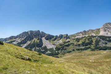 Majestic summer day in the Durmitor National park. Village Zabljak, Montenegro, Balkans, Europe. Scenic image of popular travel destination. Discover the beauty of earth. Hiking nature destination