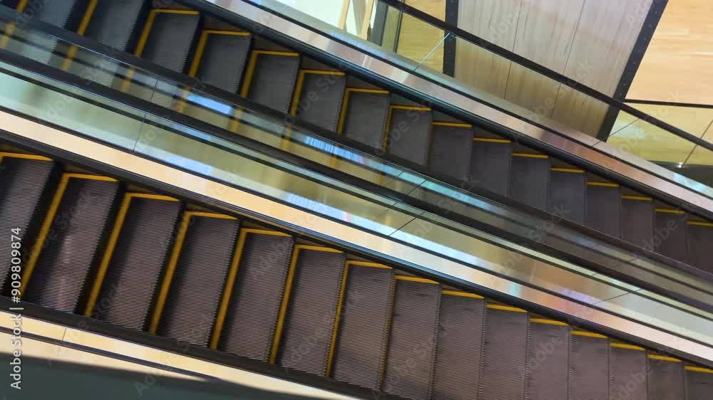 Poster close up two ways of activating escalators in a mall without people—side view from above of the esca