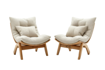 Two white chairs with pillows on them