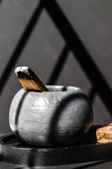 Palo Santo sticks on a light background.Aromatherapy religious rituals meditation.Wellness with aromatherapy and the occult.Healing incense Palo Santo.Organic incense of the holy ritual tree.Ibiokai