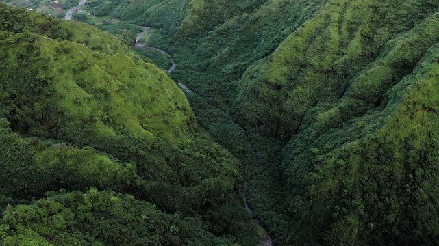 Teahupoo, Tahiti aerial drone view of the river in the valley of mountain Orohena Aorai Ronui. French Polynesia. 2024 Paris Olympics surfing spot. Paradise in Pacific Ocean. Moana Disney inspiration.