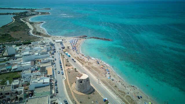 Torre Mozza is a coastal town in Salento, Puglia, known for its white sandy beaches and crystal-clear waters. The 17th-century tower, from which it takes its name, overlooks the scenic coastline
