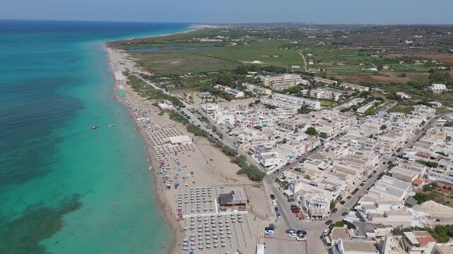 Torre Mozza is a coastal town in Salento, Puglia, known for its white sandy beaches and crystal-clear waters. The 17th-century tower, from which it takes its name, overlooks the scenic coastline