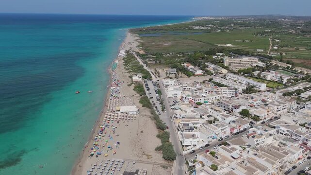 Torre Mozza is a coastal town in Salento, Puglia, known for its white sandy beaches and crystal-clear waters. The 17th-century tower, from which it takes its name, overlooks the scenic coastline
