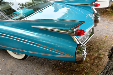 Tail fin and tail light details on the vintage car