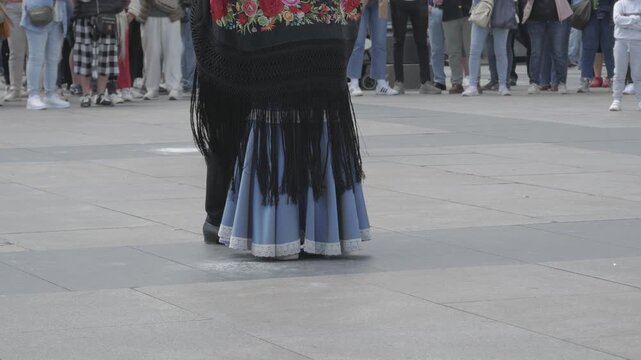 Close-up view on legs movement scene traditional Spanish Chotis, Madrid, Spain.