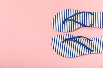 Flip flops on a bright colored background. Sandals. Summer Slippers. Vacation Concept. Rubber Slide...