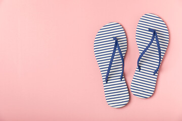 Flip flops on a bright colored background. Sandals. Summer Slippers. Vacation Concept. Rubber Slide Sandal . Top view. Space for text. Copy space