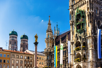 Fototapeta premium Munich skyline seen from Marienplatz with the new Town Hall and the Frauenkirche