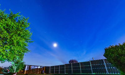 night sky over germany with partial northern lights