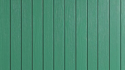 Obraz premium Detailed view of vertically aligned wooden planks painted in a bright green hue, showcasing their texture under sunlight