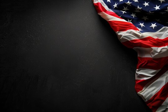 American flag draped on a dark background, leaving copy space.