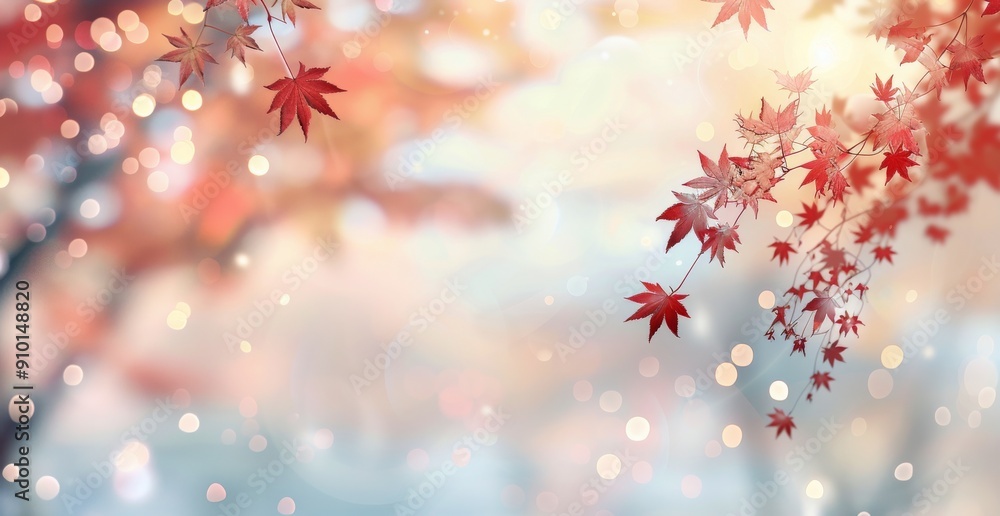 Poster autumn maple leaves against a soft, blurred background with bokeh effect