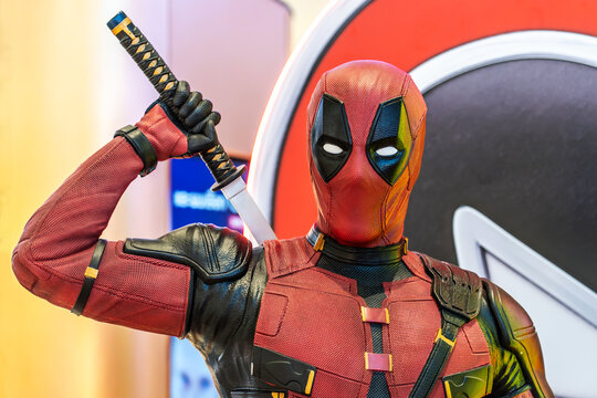 Bangkok, Thailand - Aug 03, 2024: Model of Deadpool, the iconic antihero from Marvel Comics. His red and black suit, of a movie called Deadpool Wolverine display at the cinema to promote the movie