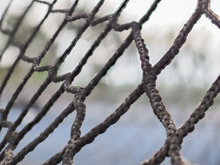 Old weathered nylon netting rope