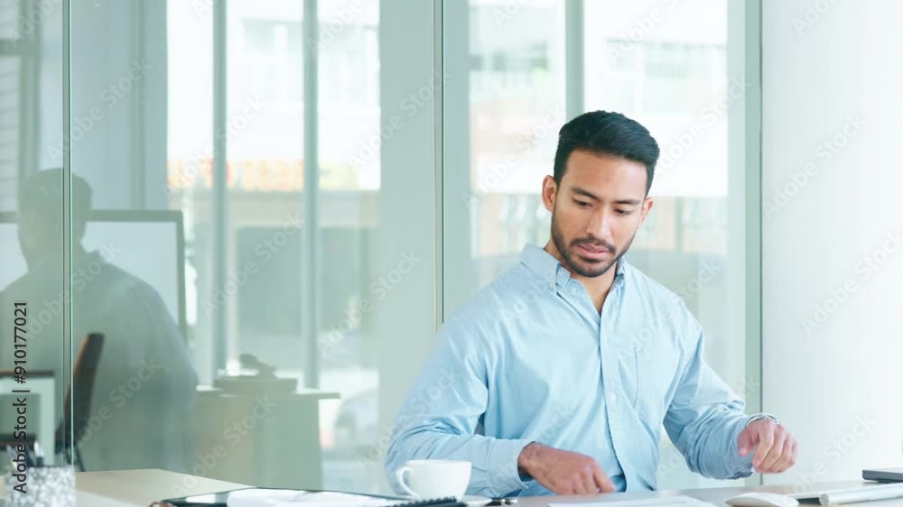 Fototapete financial advisor sitting at a desk while typing emails on a desktop computer in an office alone at 