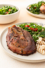 Enjoy a hearty meal with turkey paired with gluten-free pasta and a fresh salad of seasonal vegetables and herbs, complemented by ripe fruits for a balanced and nutritious breakfast or lunch