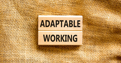 Adaptable working symbol. Concept words Adaptable working on beautiful wooden block. Beautiful canvas background. Business Adaptable working concept. Copy space.