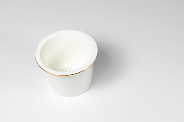 Chinese traditional Ceramic tea strainer cup for make classic tea in Chinese style isolated in white background.