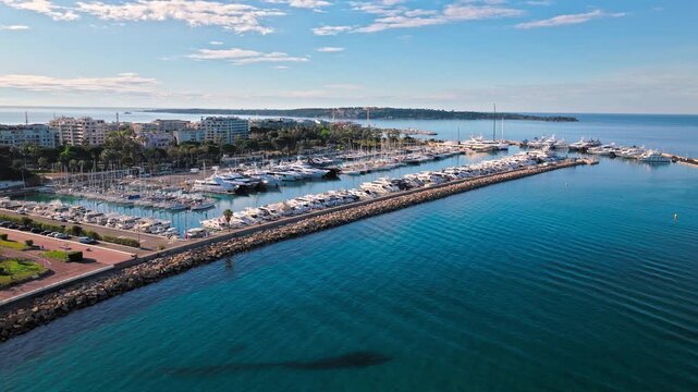 Aerial view of Cannes famous resort town on the coastal French Riviera. Luxury travel destination in France, town with sandy beaches Croisette Beach Cannes and palatial hotels.
