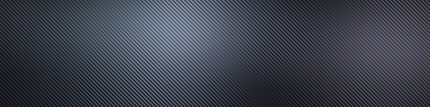Dark carbon fiber background texture creating modern diagonal pattern