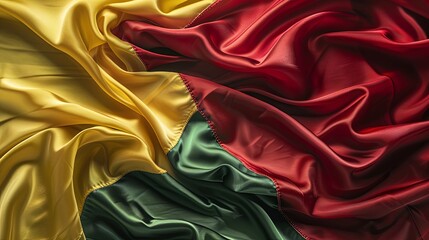 Close-up of smooth yellow, green and red fabric.