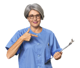 Caucasian mid-age nurse holding report person pointing by hand to a shirt copy space, proud and confident
