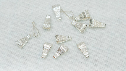 Beautiful handmade silver jewelry on white background