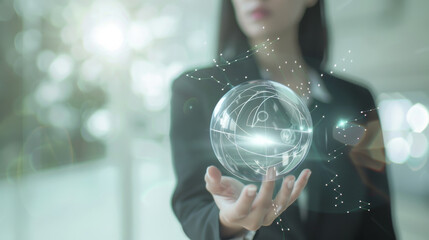 A businessperson gracefully holds a digital, glowing sphere, surrounded by interconnected nodes of light.