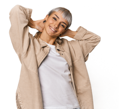Young caucasian young woman in studio stretching arms, relaxed position.