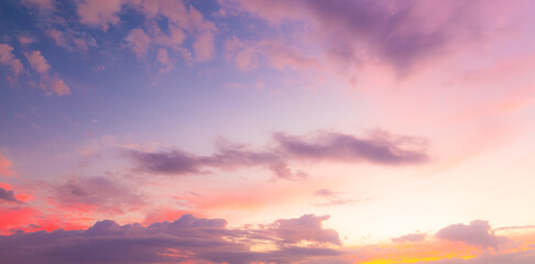 Obraz premium colorful clouds and sky,Dusk, Sunset Sky Clouds in the Evening with colorful Orange, Yellow, Pink and red sunlight and Dramatic storm clouds on Twilight sky,