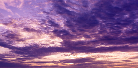 Fototapeta premium colorful clouds and sky,Dusk, Sunset Sky Clouds in the Evening with colorful Orange, Yellow, Pink and red sunlight and Dramatic storm clouds on Twilight sky,