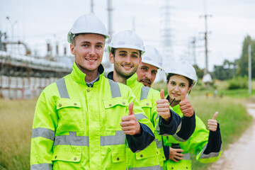 Group of oil and gas refinery engineer people worker thumbs up happy smile, Smart expert teamwork...