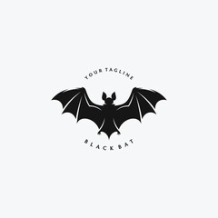 flying bat silhouette logo in vintage style